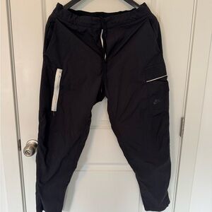 Nike Men's Black Cargo Pants with White Accents
